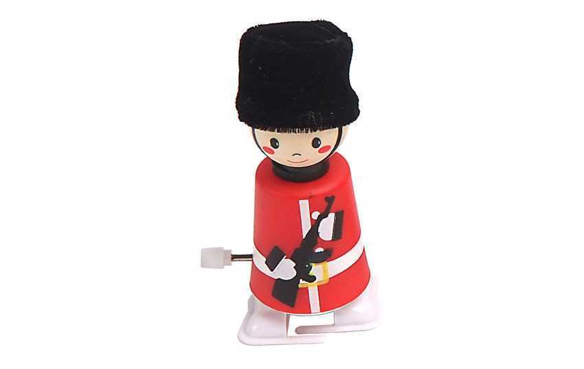 WOODEN WIND UP WALKING SOLDIER